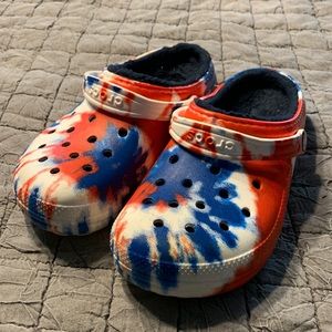 Red whit and blue fun crocs with soft lining